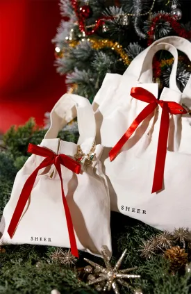 Holiday gift tote with 3 charms (free over $3000)